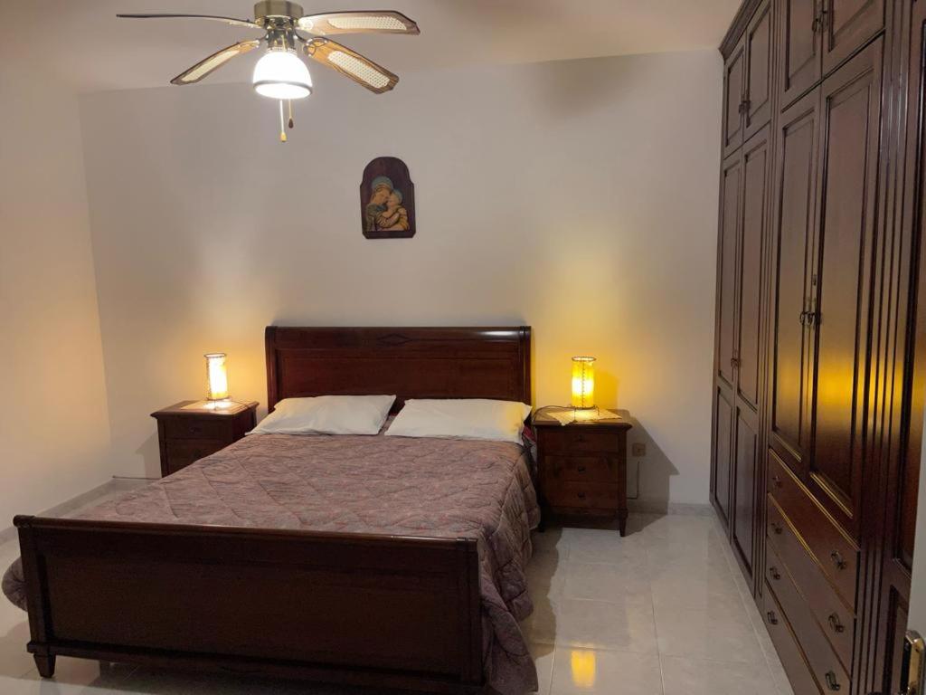 Postel nebo postele na pokoji v ubytování Felline In Bed&Breakfast Dimora di Charme el Salento