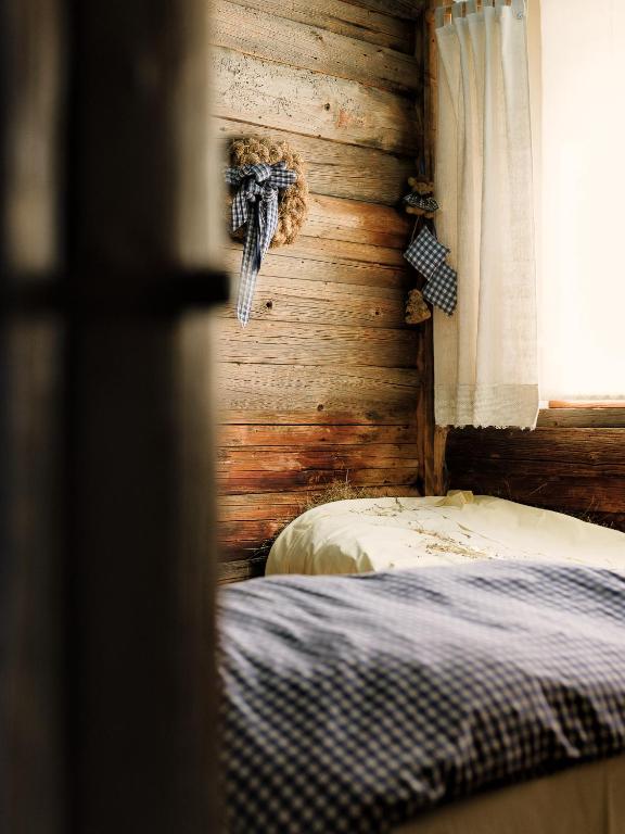 Una cama o camas en una habitación de Hotel Forer