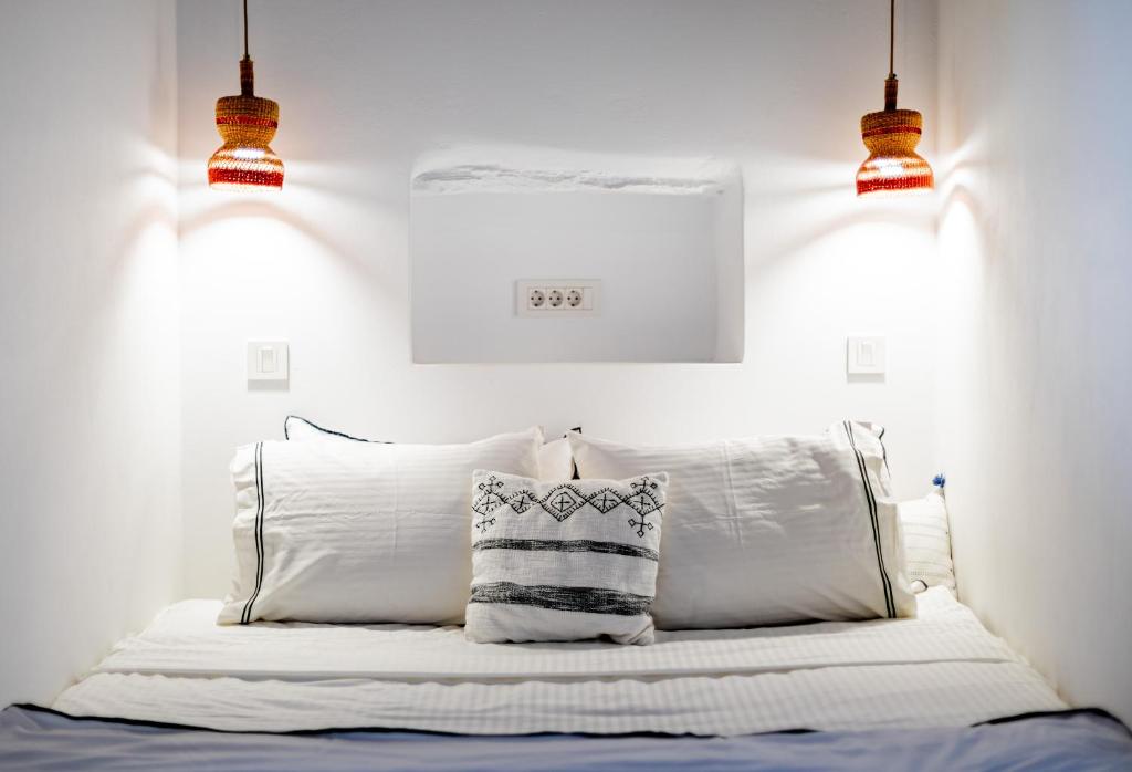 Voodi või voodid majutusasutuse Makarias Traditional Luxury Villas toas