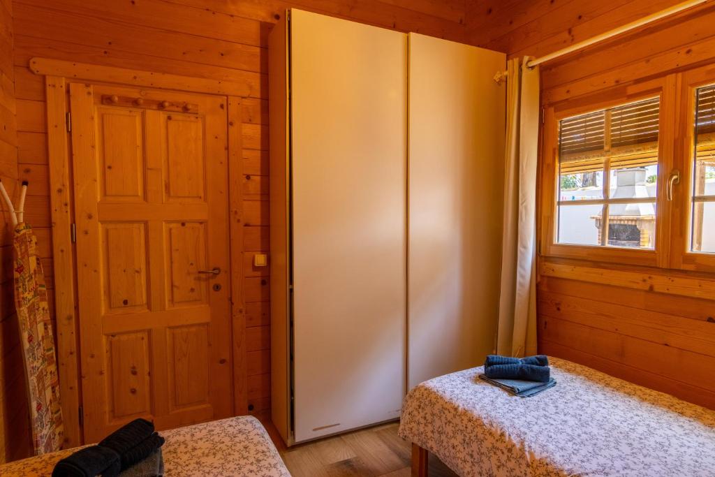 Postel nebo postele na pokoji v ubytování La cabaña de Parisito