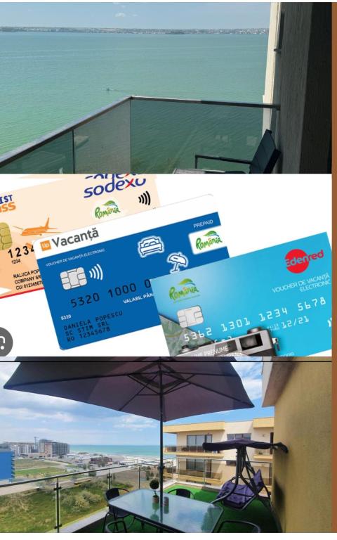 a banner for a beach house with an umbrella at VIRGO Apartaments Mamaia in Mamaia