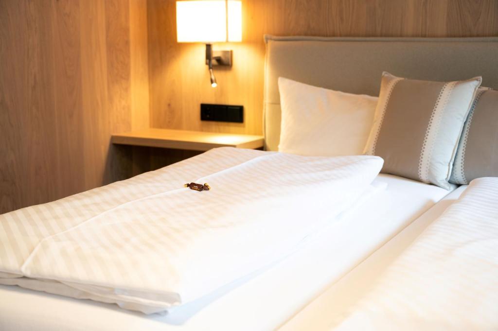 Krevet ili kreveti u jedinici u okviru objekta Genuss- & Aktivhotel Sonnenburg
