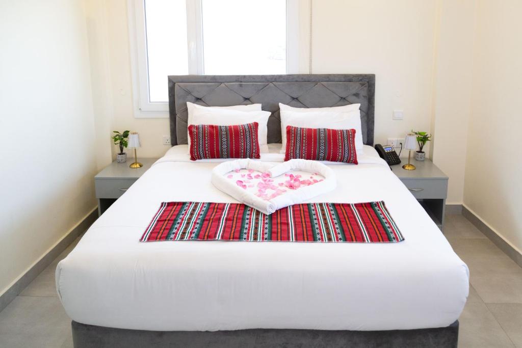 Postel nebo postele na pokoji v ubytování NASEEM HOTEL