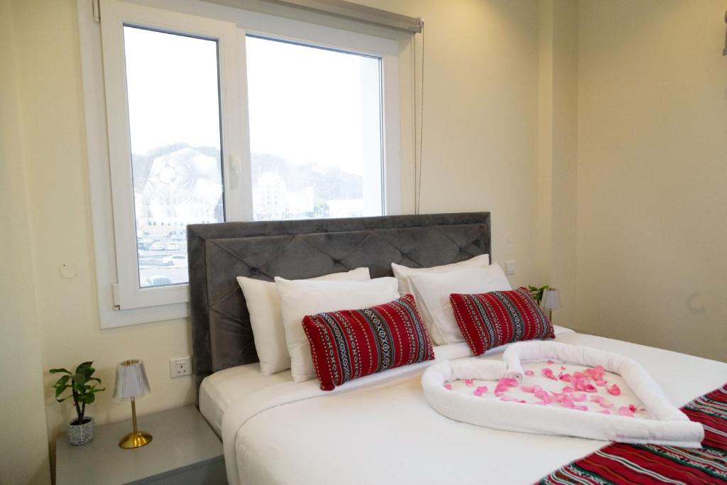 Postel nebo postele na pokoji v ubytování NASEEM HOTEL