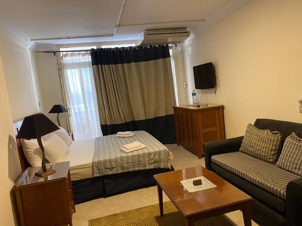 Postel nebo postele na pokoji v ubytování Bianchi Hotel