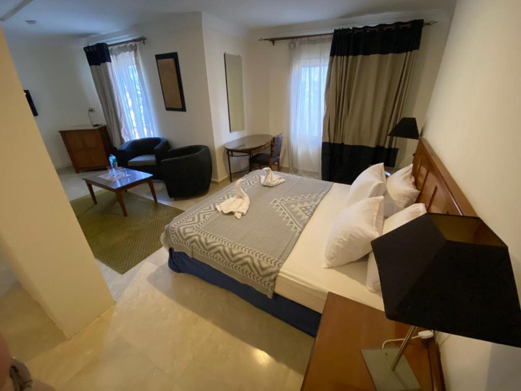 Postel nebo postele na pokoji v ubytování Bianchi Hotel