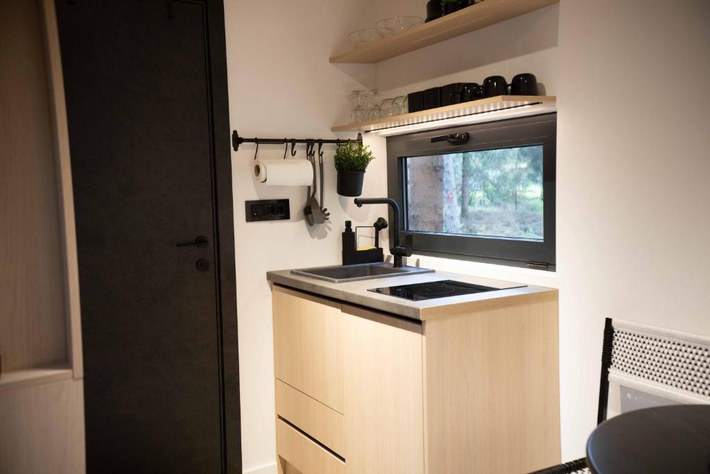 Kuchyň nebo kuchyňský kout v ubytování Minima Casa