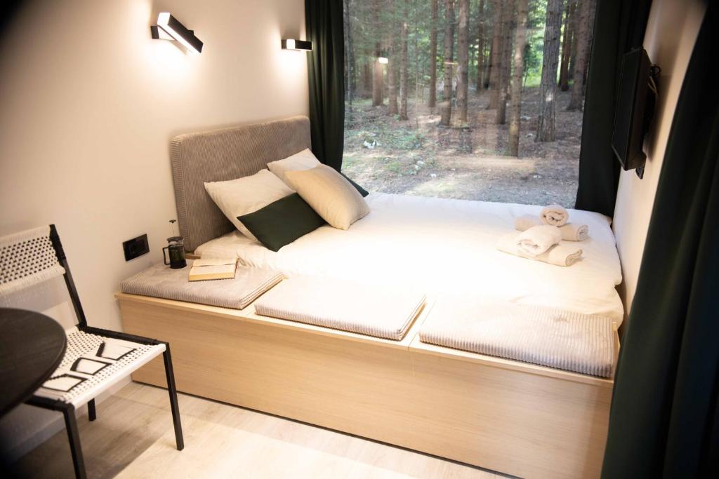Postel nebo postele na pokoji v ubytování Minima Casa