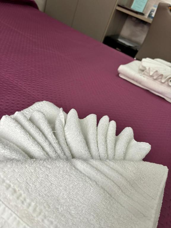 Letto o letti in una camera di Scilla Resort