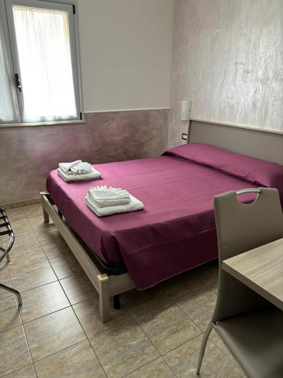 Letto o letti in una camera di Scilla Resort