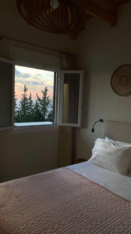 Posteľ alebo postele v izbe v ubytovaní Zephyros Villas - Agios Nikitas