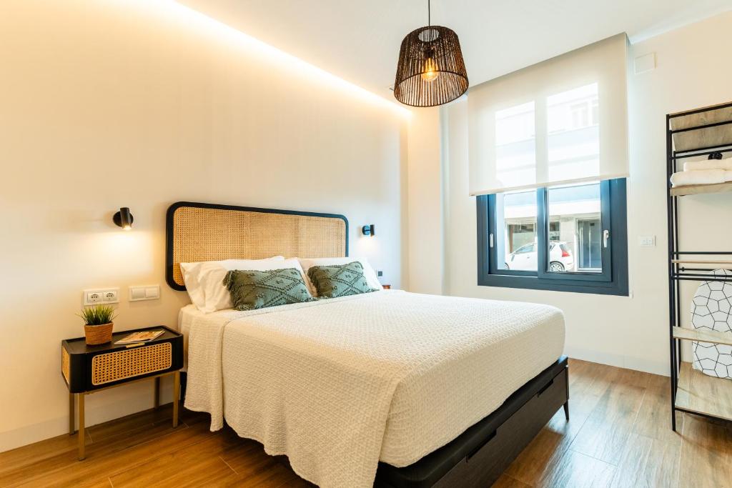 Un pat sau paturi într-o cameră la Villa de Paradas