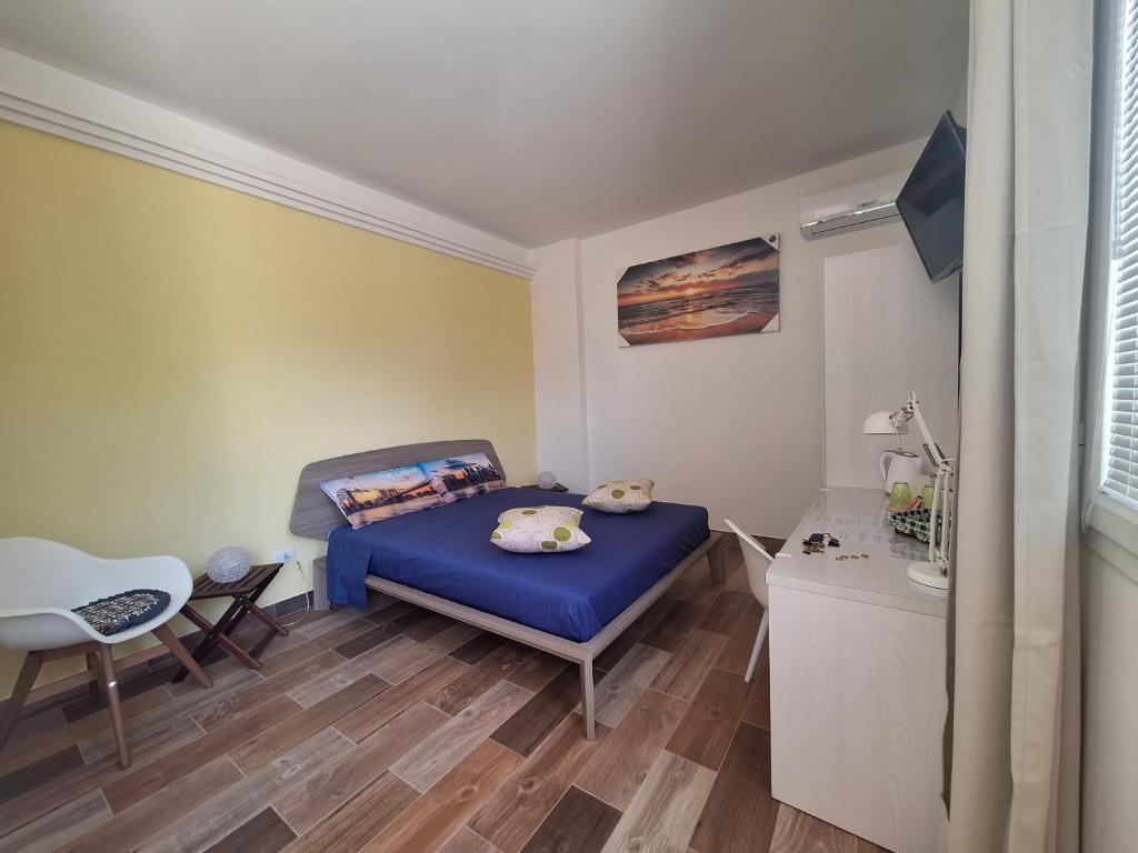 Postel nebo postele na pokoji v ubytování B&B Salvo e Terry