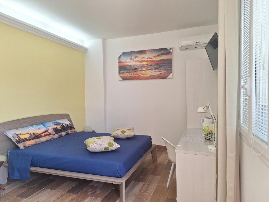 Postel nebo postele na pokoji v ubytování B&B Salvo e Terry
