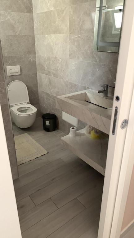 Koupelna v ubytování Meri Rooms