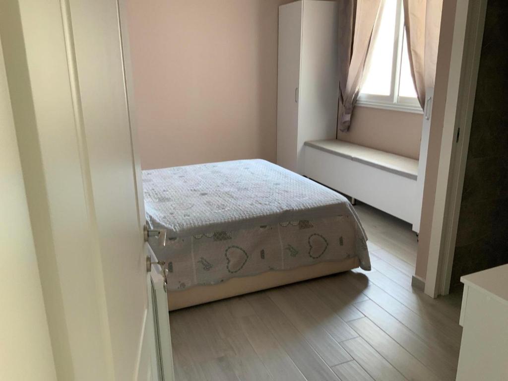 Postel nebo postele na pokoji v ubytování Meri Rooms