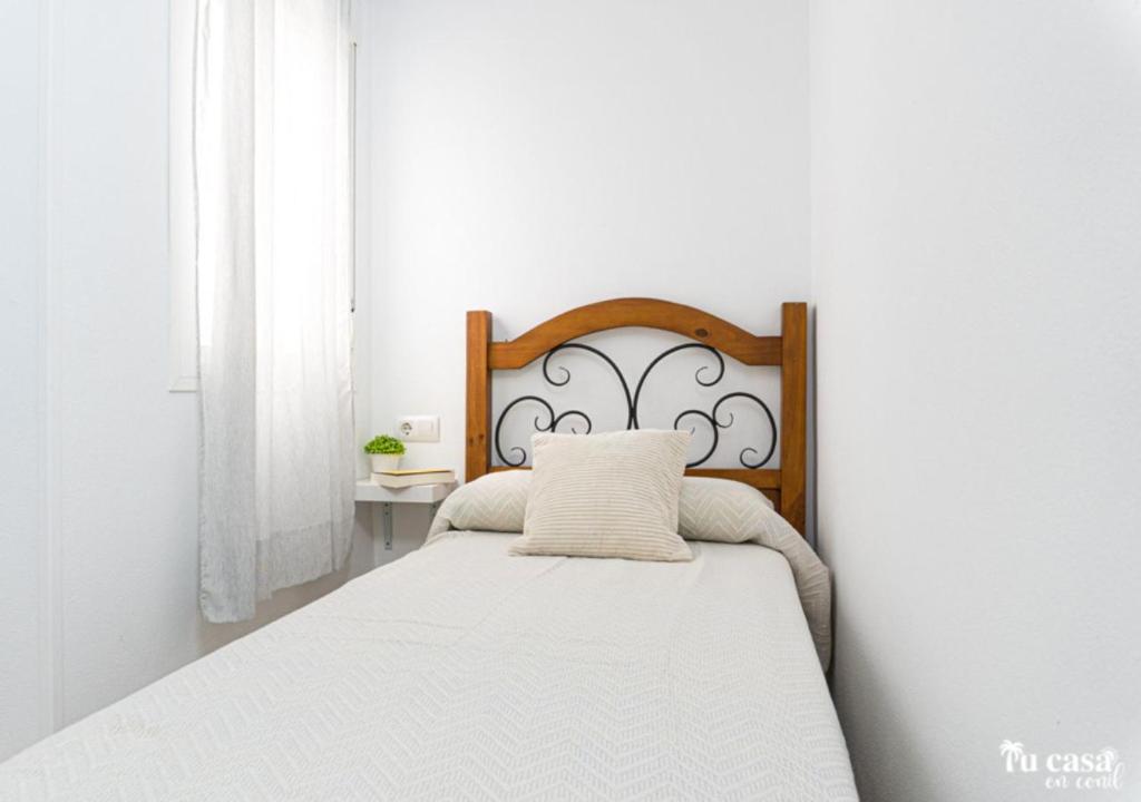 Posteľ alebo postele v izbe v ubytovaní apartamento Juani solo para Familia o parejas "tucasaenconil"