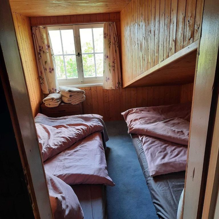 Postel nebo postele na pokoji v ubytování Blockhaus Birentobel