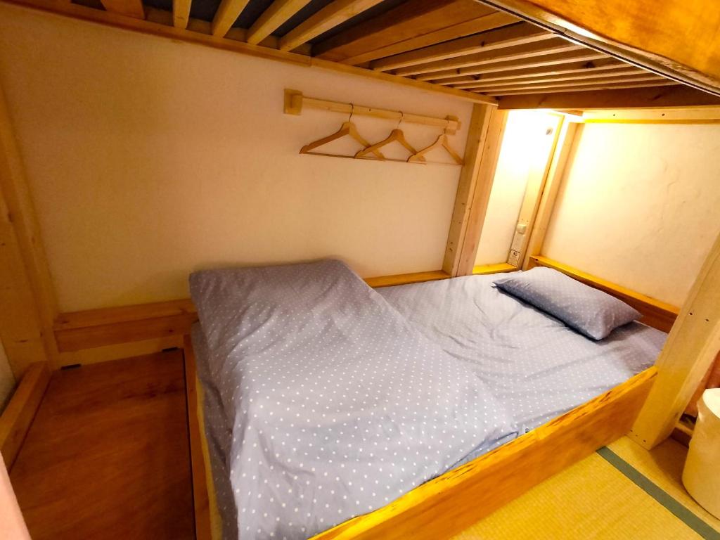 Postel nebo postele na pokoji v ubytování Hostel Caranashi