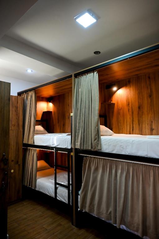 Postel nebo postele na pokoji v ubytování StarHostel
