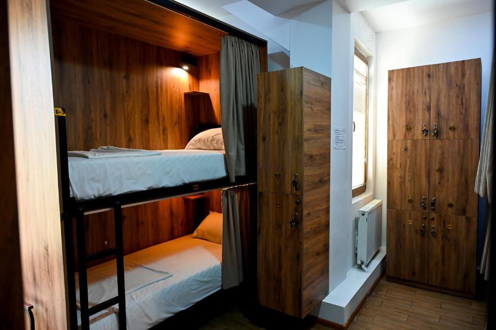 Postel nebo postele na pokoji v ubytování StarHostel