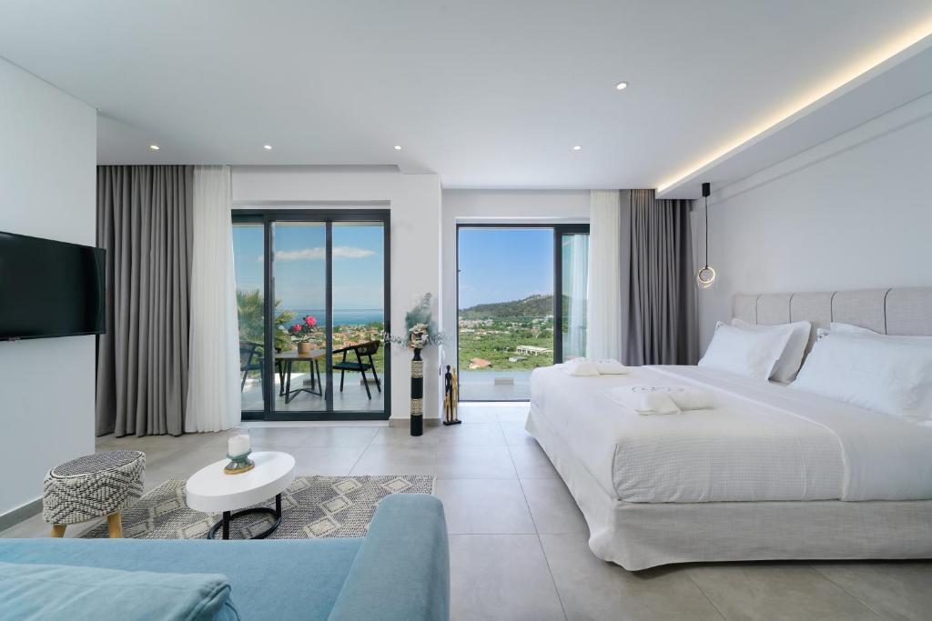 Postel nebo postele na pokoji v ubytování Kefi Luxury Villas