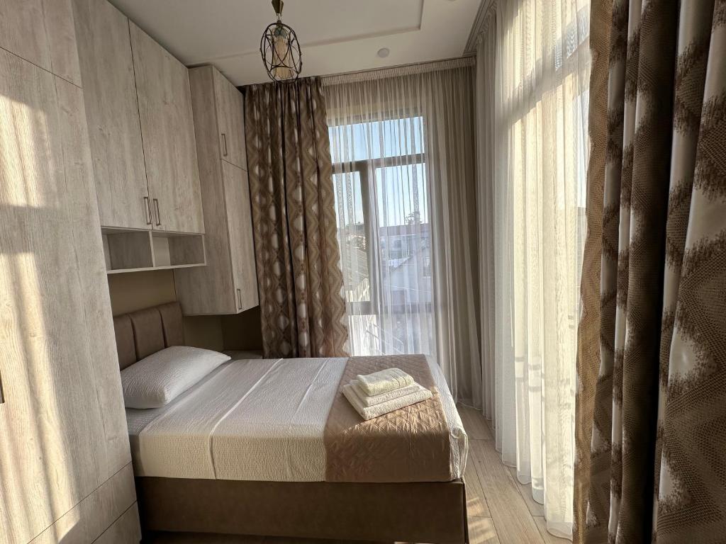Letto o letti in una camera di Ameli Apartments BTM