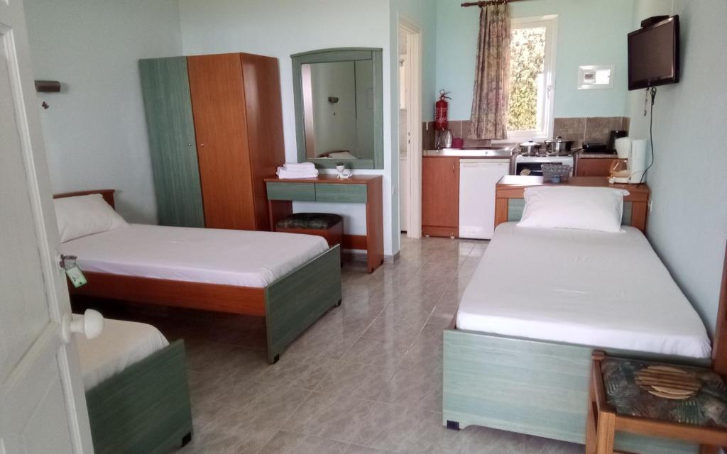 Postel nebo postele na pokoji v ubytování Panorama Rooms