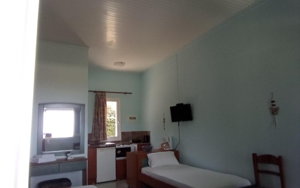 Postel nebo postele na pokoji v ubytování Panorama Rooms