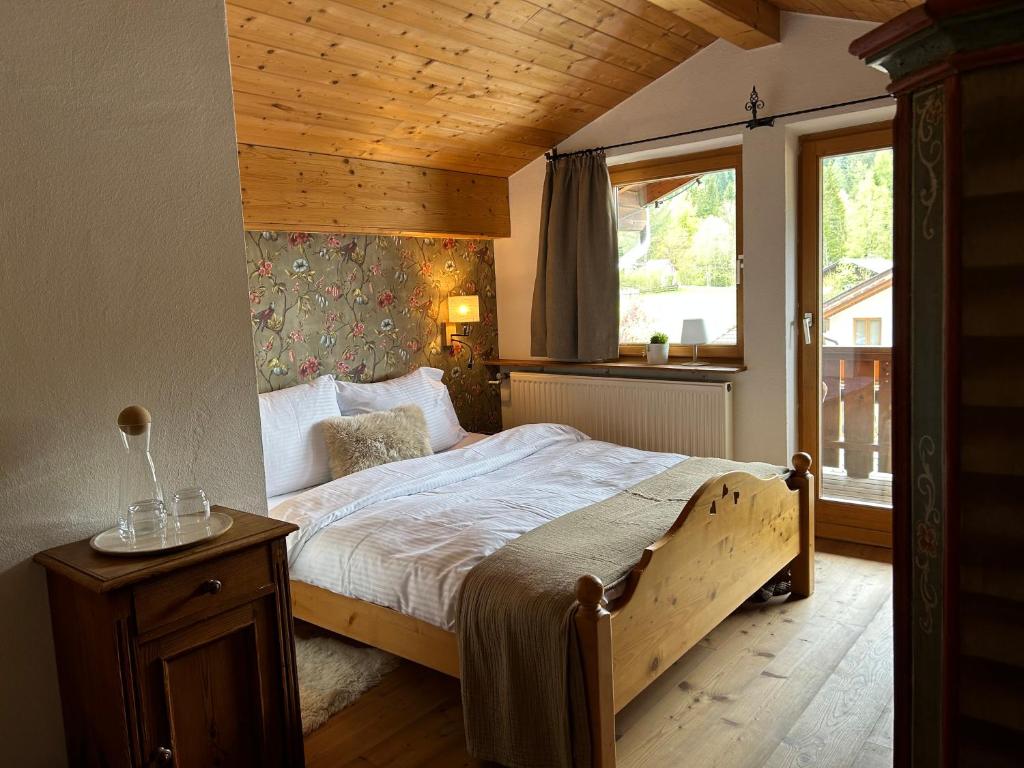 Säng eller sängar i ett rum på Das Halali - dein kleines Hotel an der Zugspitze