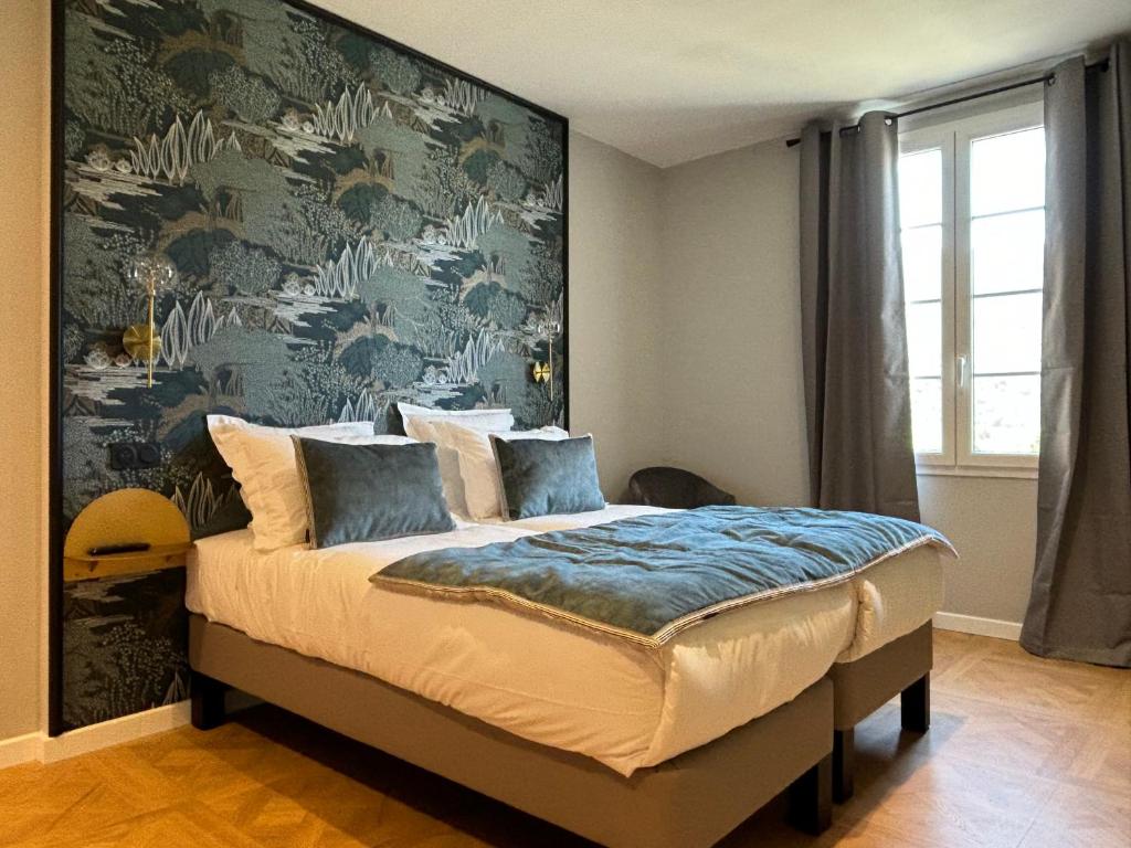 Postel nebo postele na pokoji v ubytování Grand Hôtel de la Scala