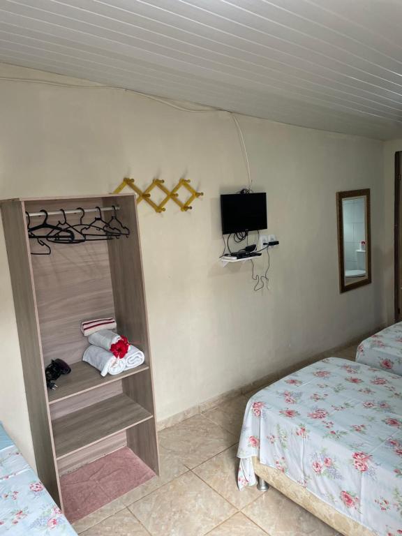 Postel nebo postele na pokoji v ubytování Estação Noronha