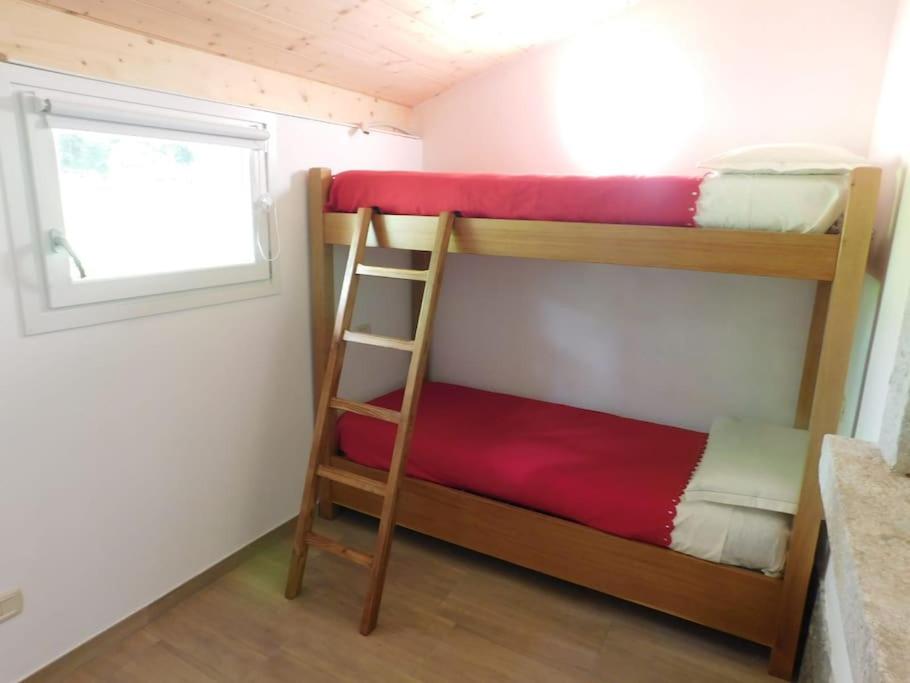 Palanda nebo palandy na pokoji v ubytování Chilometro 29 terra
