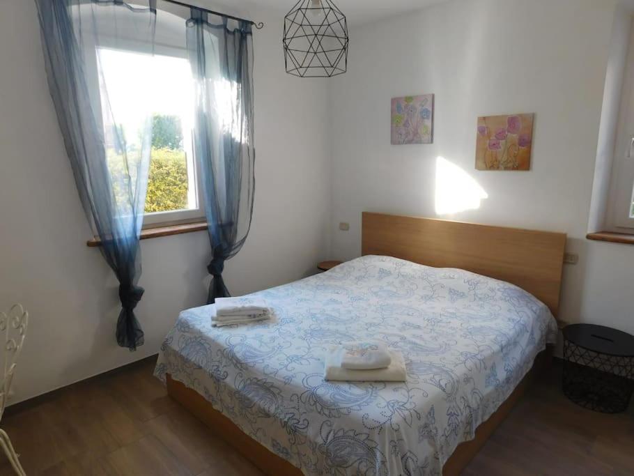 Postel nebo postele na pokoji v ubytování Chilometro 29 terra