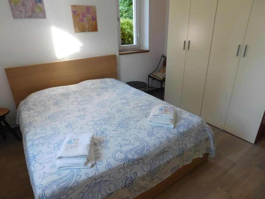 Postel nebo postele na pokoji v ubytování Chilometro 29 terra