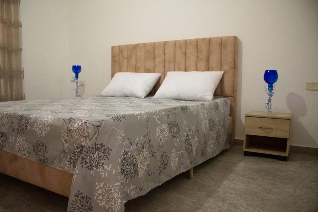 Postel nebo postele na pokoji v ubytování Maison de vacances Vue sur mer Gabes