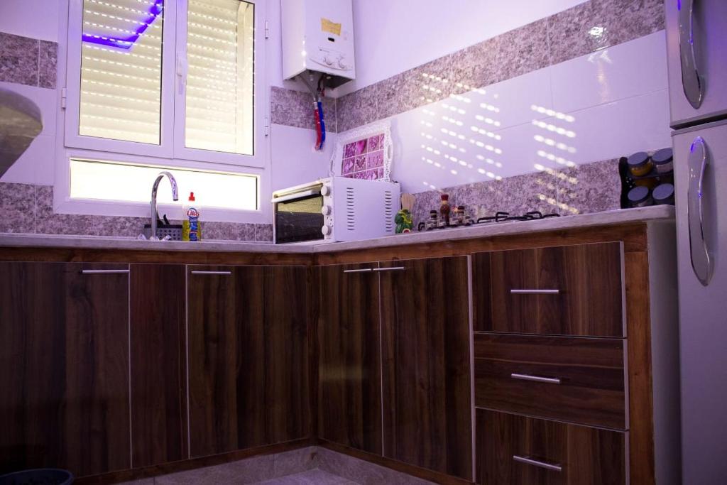 Kuchyň nebo kuchyňský kout v ubytování Maison de vacances Vue sur mer Gabes