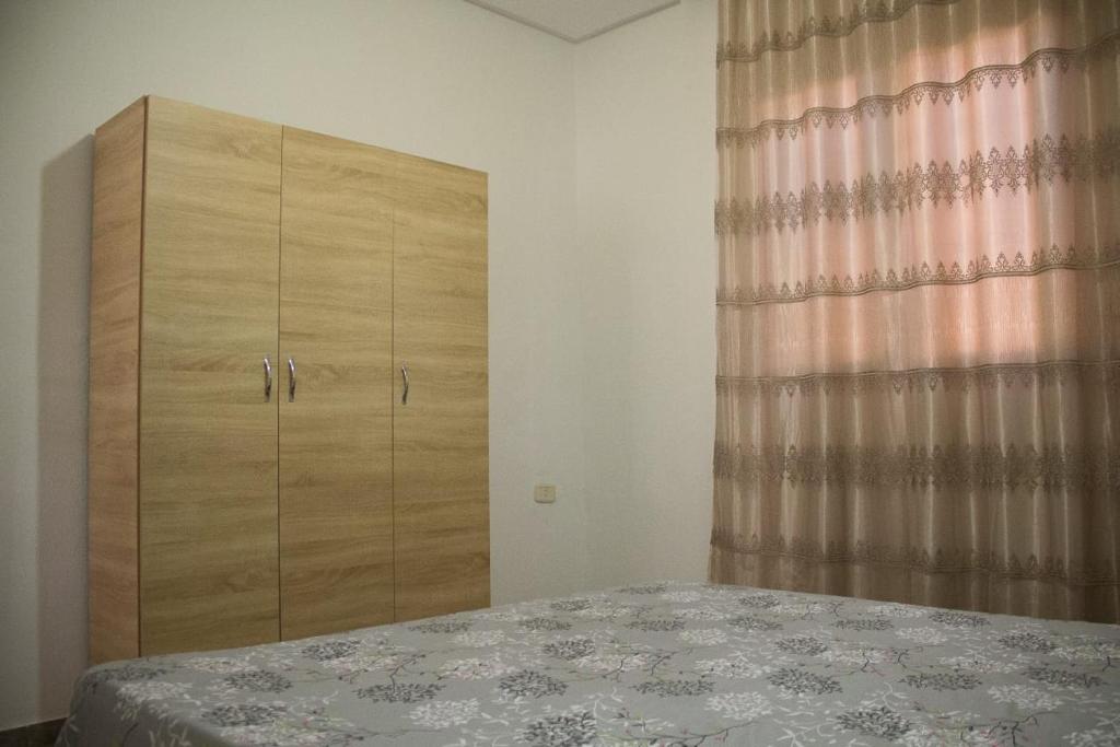 Postel nebo postele na pokoji v ubytování Maison de vacances Vue sur mer Gabes