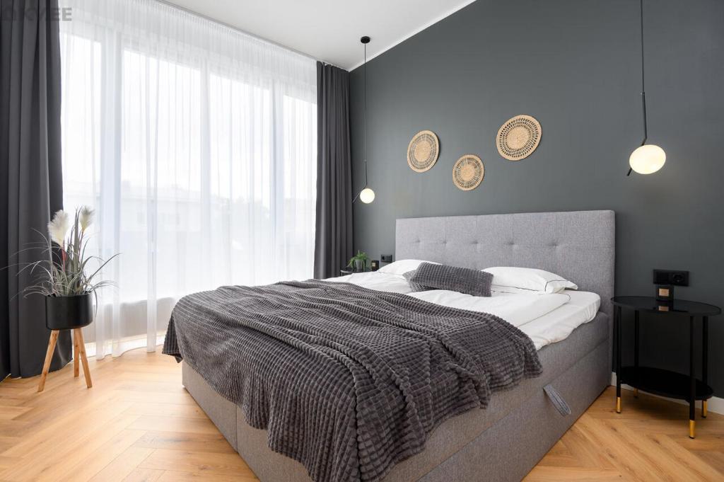 Postel nebo postele na pokoji v ubytování Luxory apartment in the Pärnu city center.