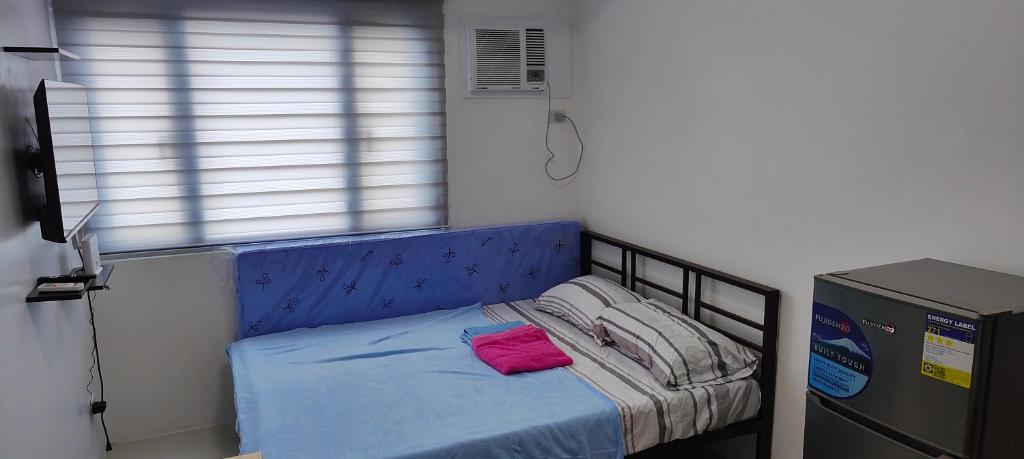 Giường trong phòng chung tại Grand Riviera Suites