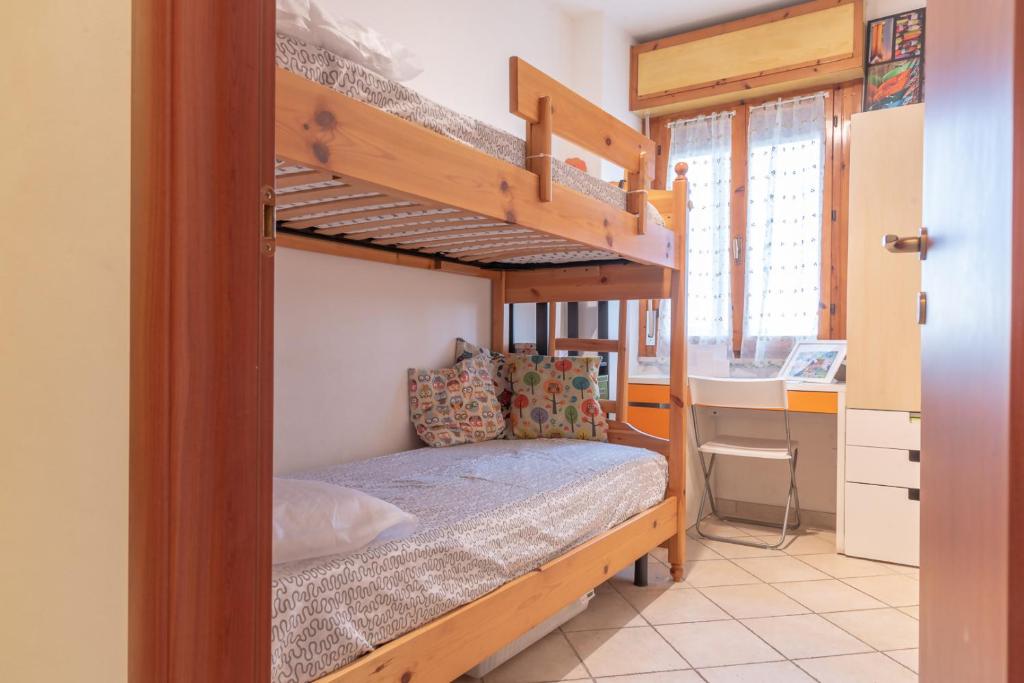 Postel nebo postele na pokoji v ubytování Verde lido adriano vista mare