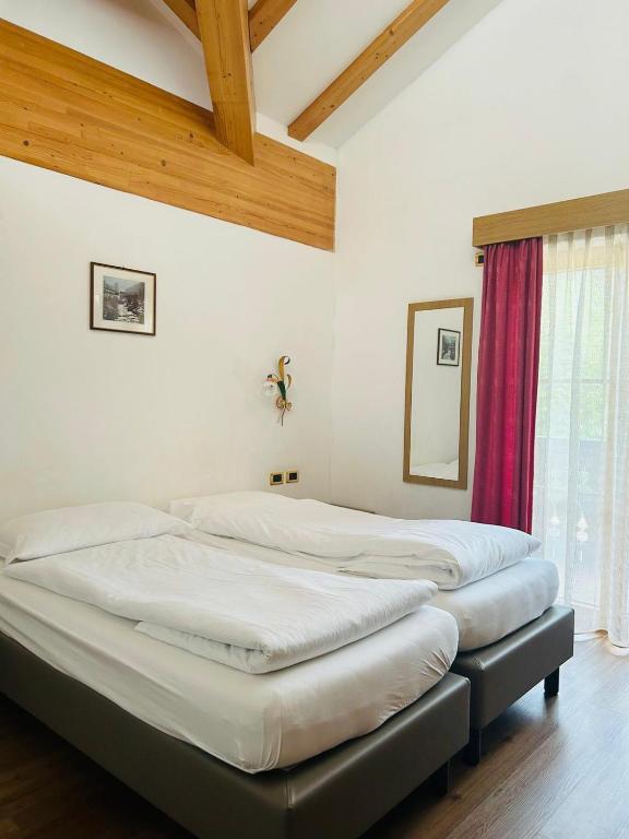 Postel nebo postele na pokoji v ubytování EL CIASEL