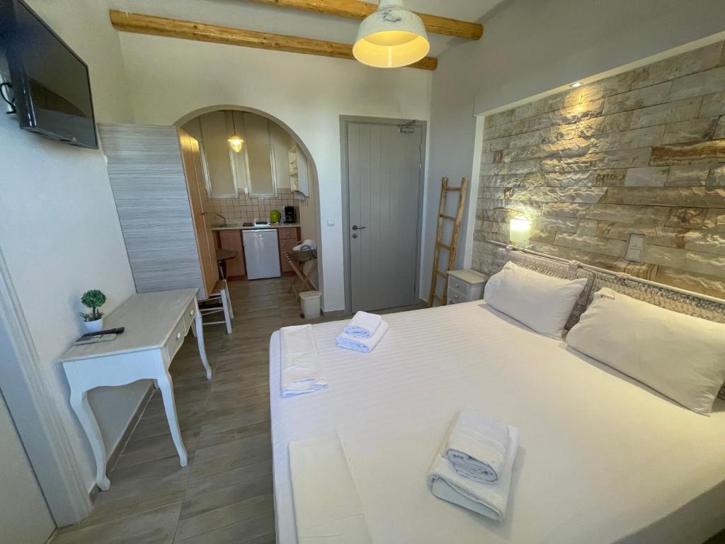 Posteľ alebo postele v izbe v ubytovaní Ioanna Apartments