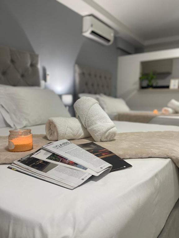 מיטה או מיטות בחדר ב-110 Loft