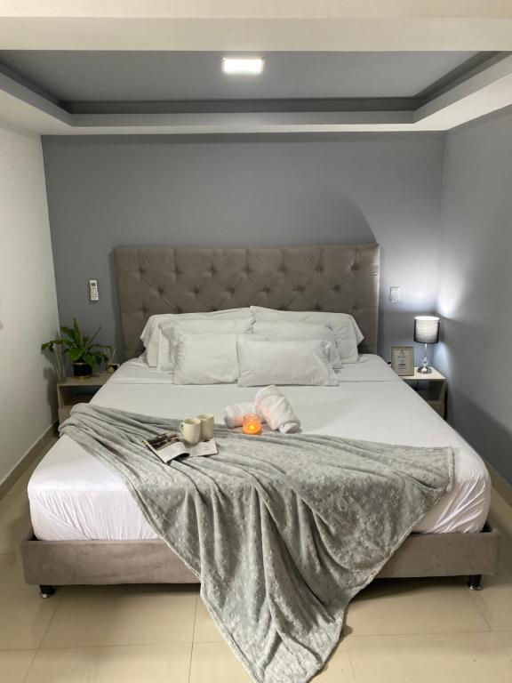מיטה או מיטות בחדר ב-110 Loft