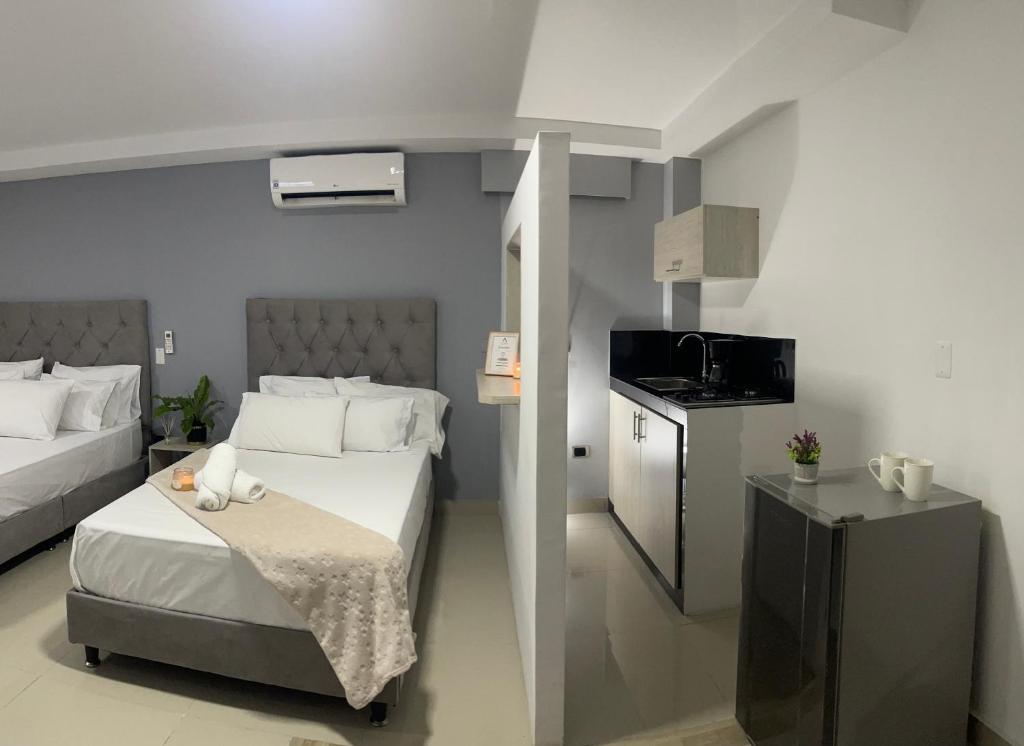 מיטה או מיטות בחדר ב-110 Loft