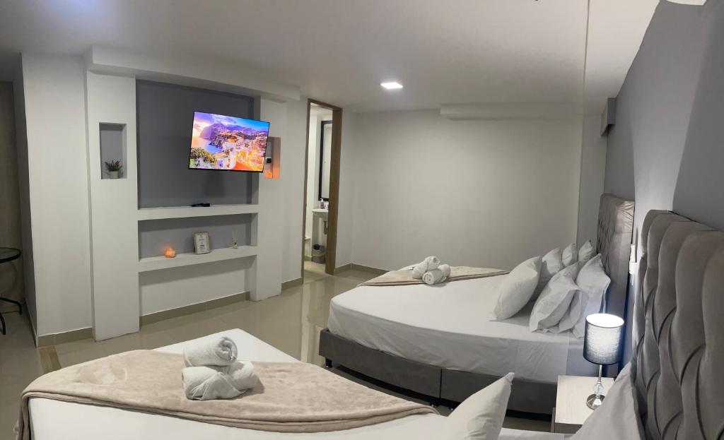 מיטה או מיטות בחדר ב-110 Loft