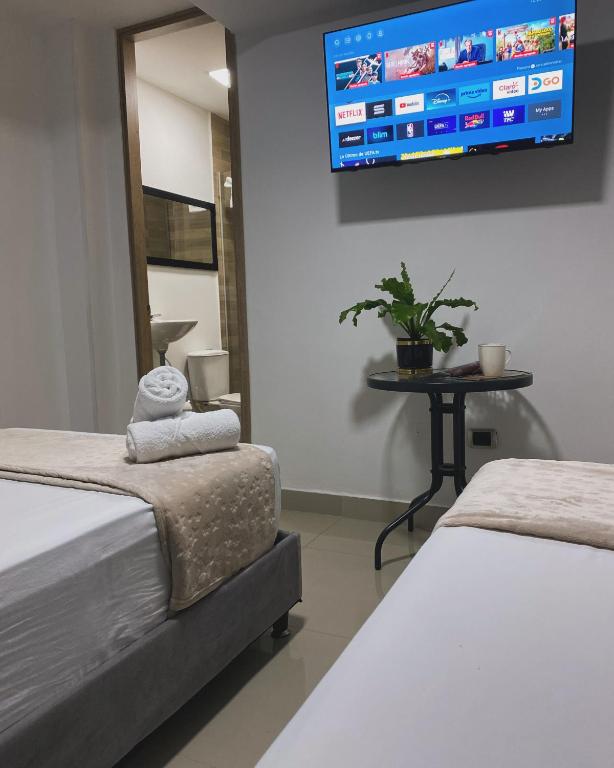 מיטה או מיטות בחדר ב-110 Loft