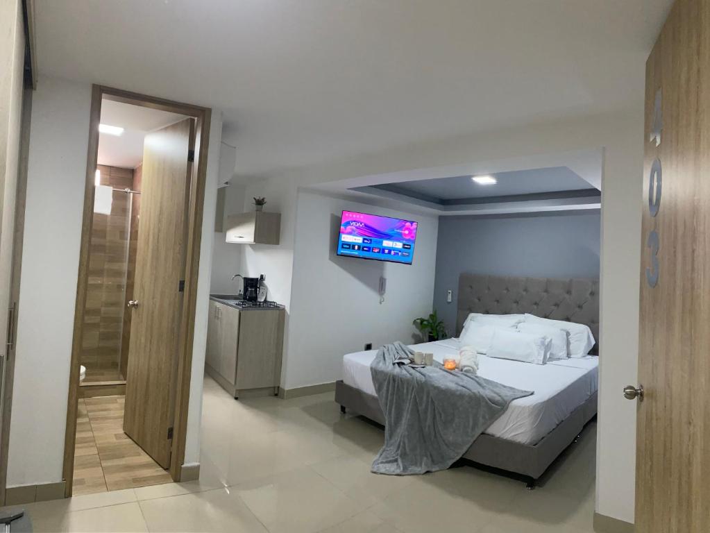 מיטה או מיטות בחדר ב-110 Loft