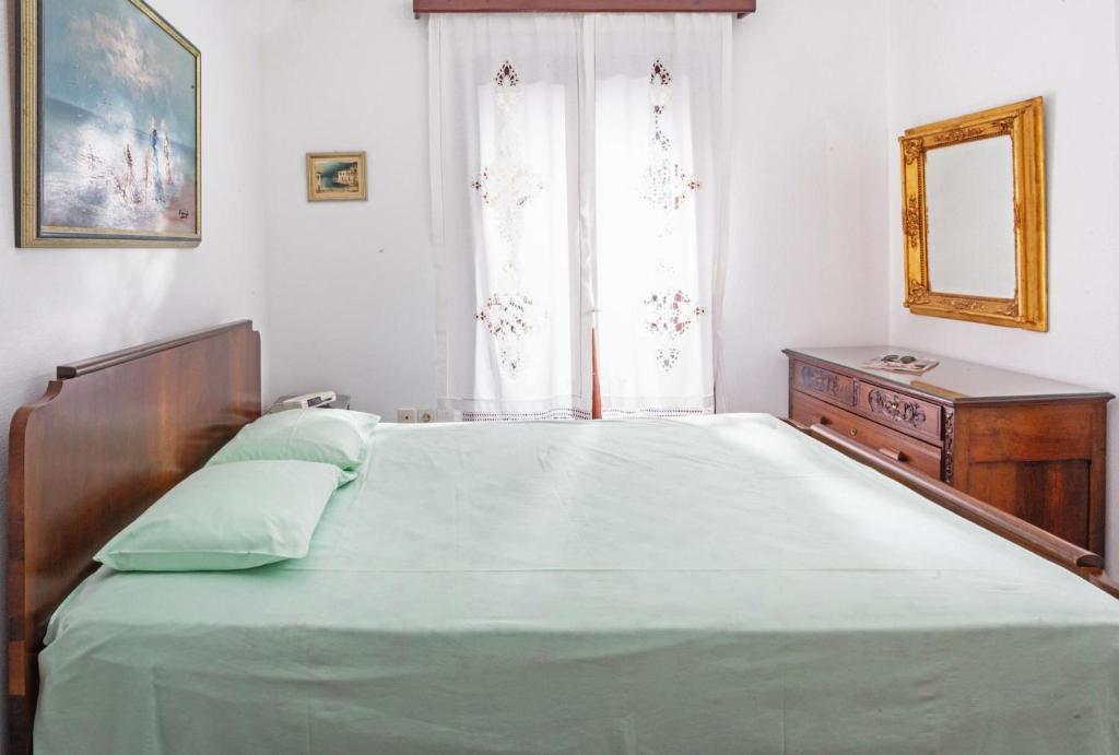 Postel nebo postele na pokoji v ubytování Afissos Seaside Cottage